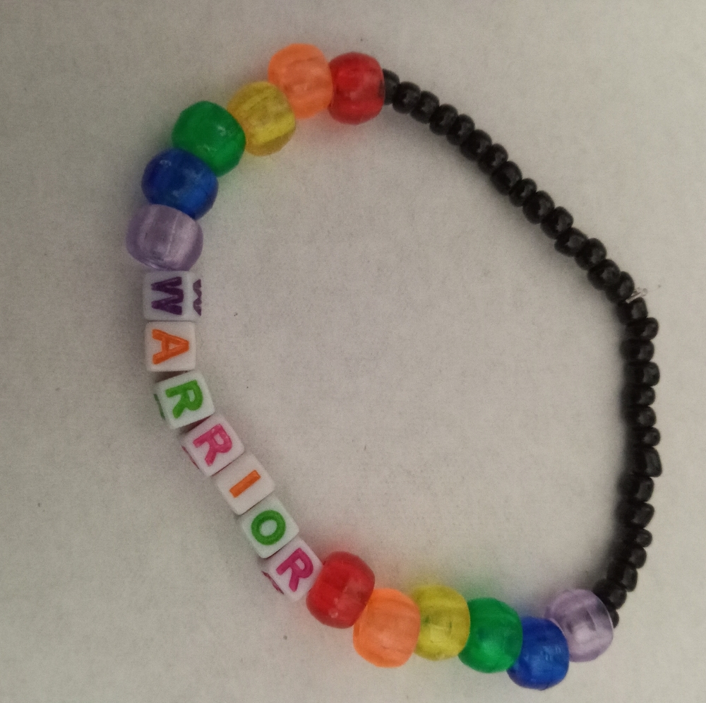 hand crafted Rainbow Warrior LGBT pride beaded statement logo bracelet